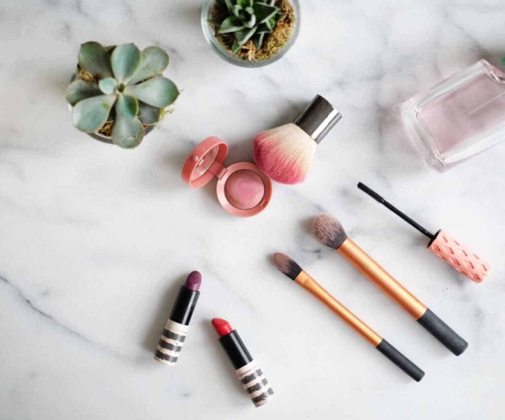 Selection of makeup on marble dressing table