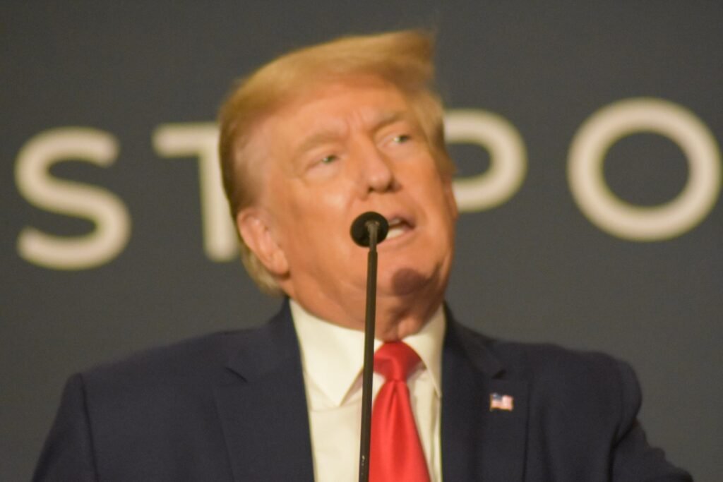 PROVINCETOWN, MASSACHUSETTS: A handsome Cape Cod shingled home with white trimmed windows and two upstairs dormers